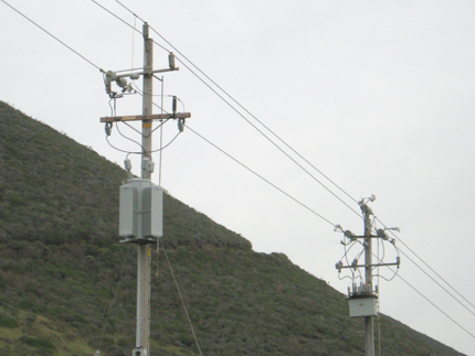 Electric pole with transformer